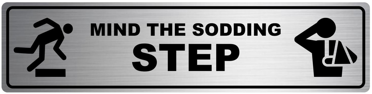 Mind the Sodding Step Safety Sign. Exterior Grade Self Adhesive, Easy to Install – by North By North East – Safety & Warning Signs