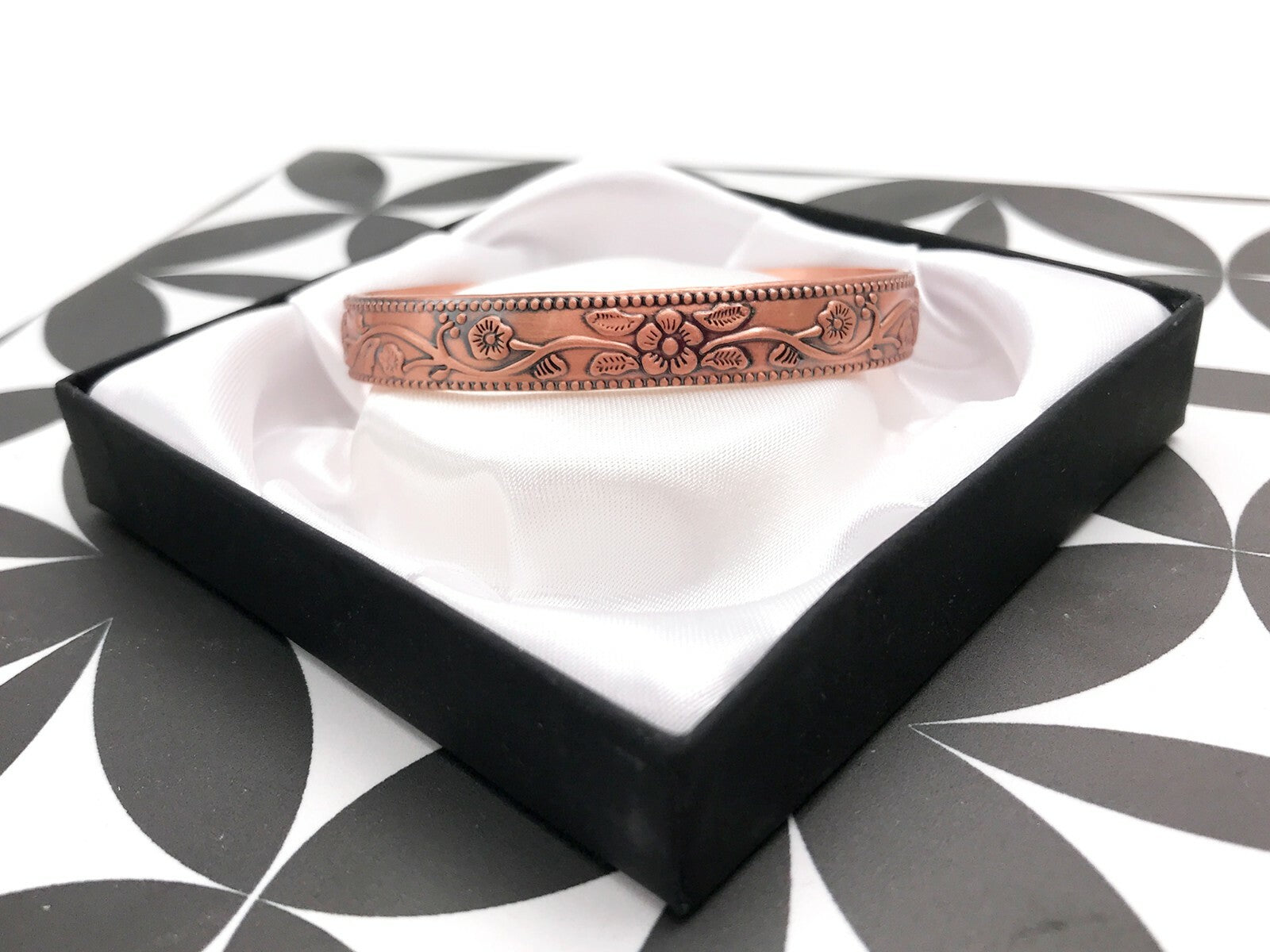 Copper Magnetic Bracelet with Delicate Elderflower Design (small size) – by North By North East – Safety & Warning Signs