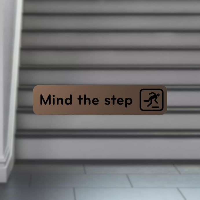 Mind The Step Adhesive Sign – Copper Aluminium 50×195mm, Peel & Stick – by North By North East – Safety & Warning Signs