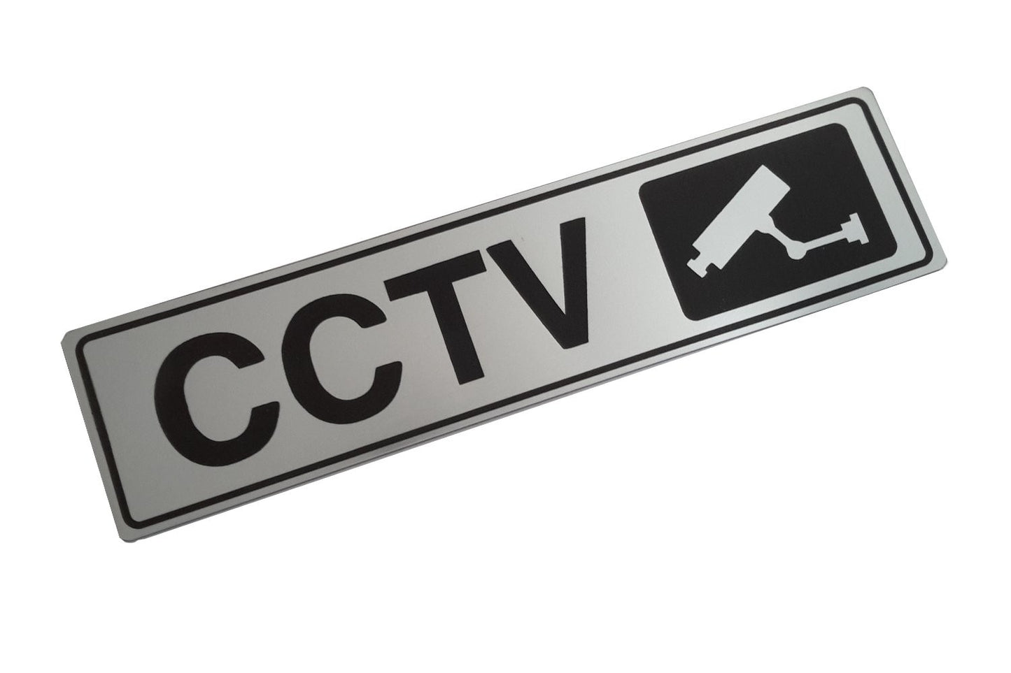 CCTV In Operation Adhesive Sign – Brushed Silver Aluminium 50×195mm – by North By North East – Security & CCTV Signs