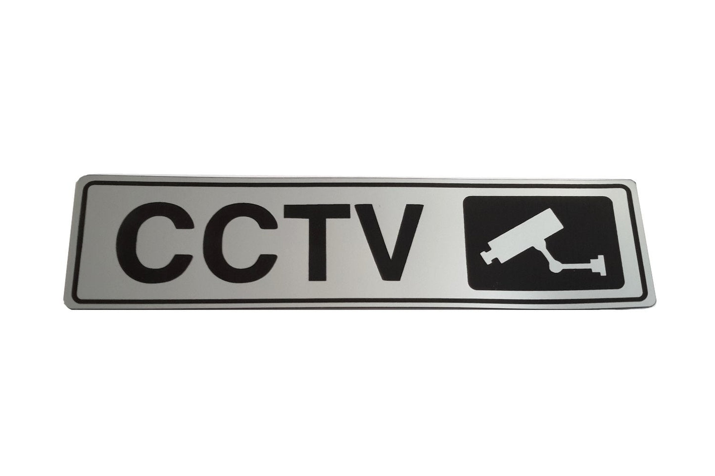 CCTV In Operation Adhesive Sign – Brushed Silver Aluminium 50×195mm – by North By North East – Security & CCTV Signs