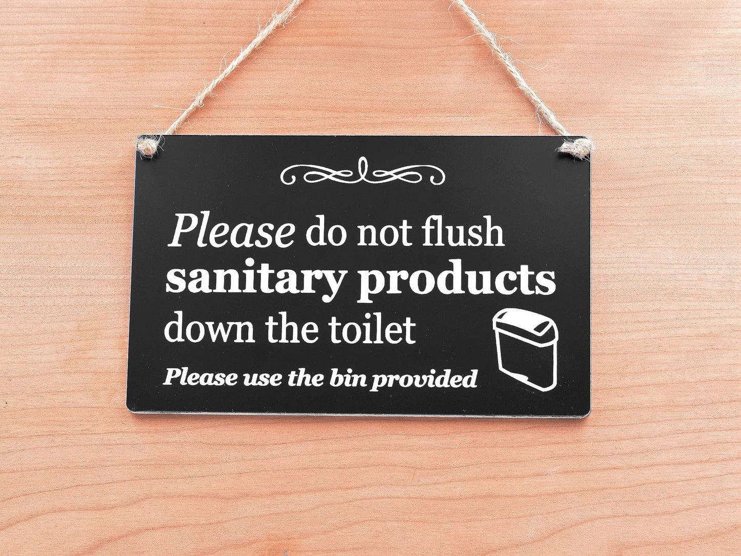 Black Hanging “Please Do Not Flush Sanitary Products” Sign – 145x90mm Waterproof – by North By North East – Signs