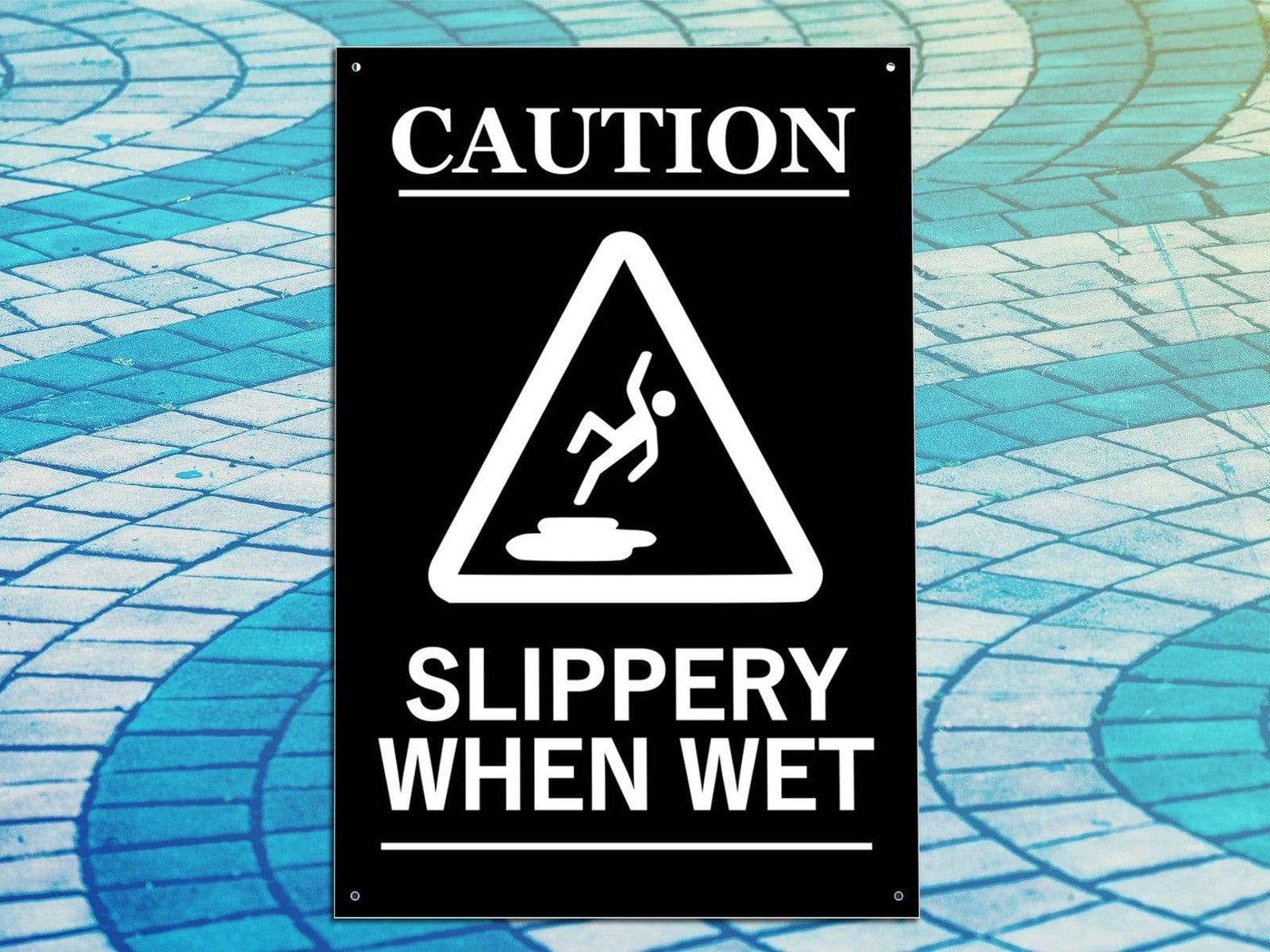 Caution Slippery When Wet Safety Sign – A4 Black ACM with 4 Screw Holes – by North By North East – Safety & Warning Signs